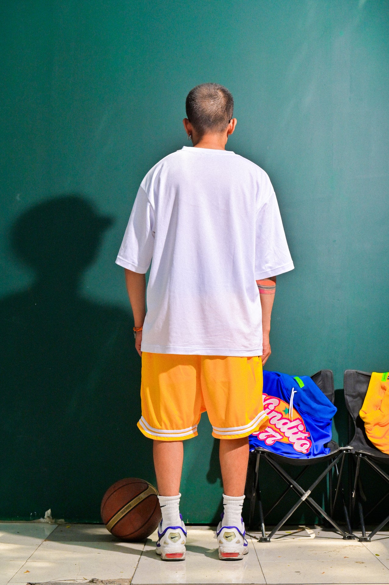 HOMETEAM SHORTS IN MUSTARD
