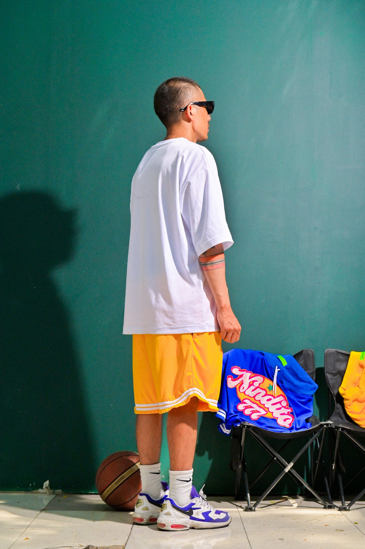 HOMETEAM SHORTS IN MUSTARD